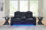 Fyne-Dyme Sapphire Faux Leather Power Reclining Loveseat with Console angled front view