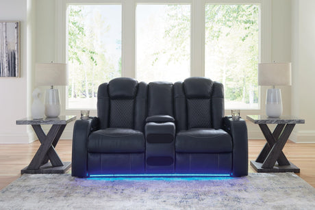 Fyne-Dyme Sapphire Faux Leather Power Reclining Loveseat with Console angled front view