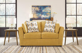 Keerwick Sunflower Chenille Loveseat front angle showing plush cushions and pillows