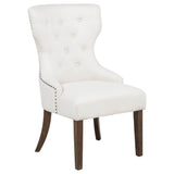 Baney dining side chair cream fabric with button-tufted wingback and dark oak legs