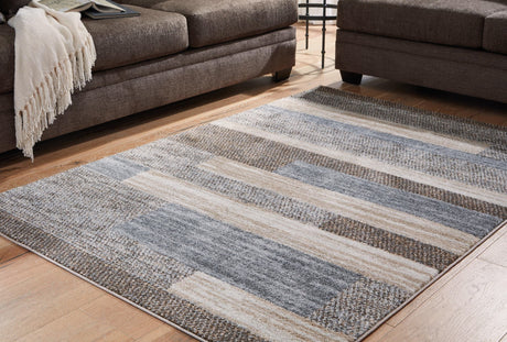 Sethburn Large Rug in cream, brown, and gray, angled view