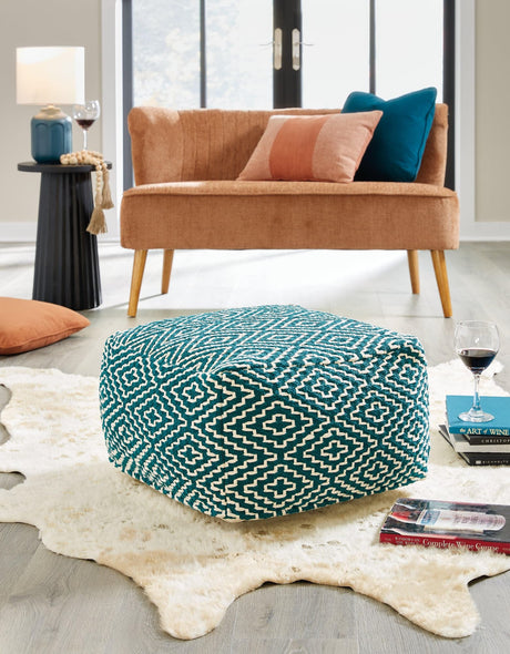 Brynnsen Teal and Ivory geometric patterned pouf angled view
