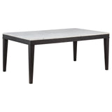 Averill 72-inch dining table with white marble top and coffee bean tapered legs, angled view