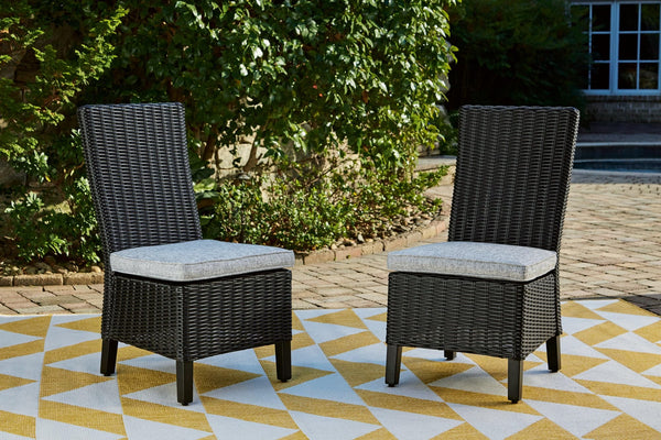 Beachcroft black resin wicker outdoor side chair with light gray cushion - front view