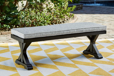 Beachcroft outdoor bench with black resin wicker and light gray cushion front view