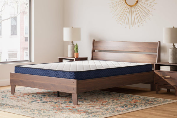 Ashley Firm White King Mattress front view with white quilted cover