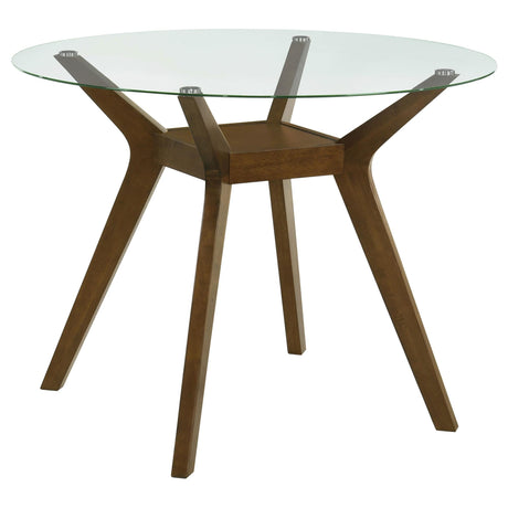 Paxton 48-inch round glass top dining table, front view showing wood legs