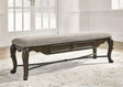 Front view of Maylee 63-inch dark brown dining bench with upholstered seat