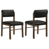 Kehoe upholstered dining side chair black leatherette with walnut rubberwood legs front view