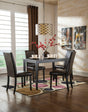 Kimonte dark brown dining table with four upholstered chairs front view
