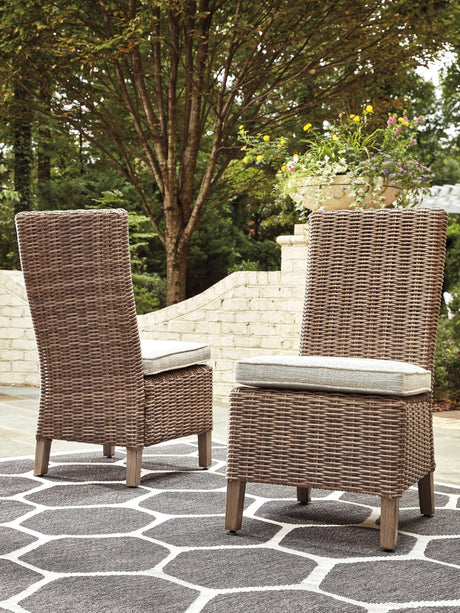 Beachcroft Beige outdoor dining table with two benches and two chairs
