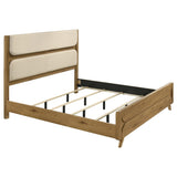 Bennett Eastern King Upholstered Panel Bed front view in cream and light oak