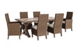 Beachcroft Beige outdoor dining table with 2 armchairs and 4 side chairs set outdoors