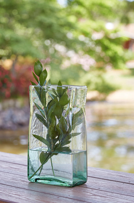 Small green ceramic vase with classic design, front view