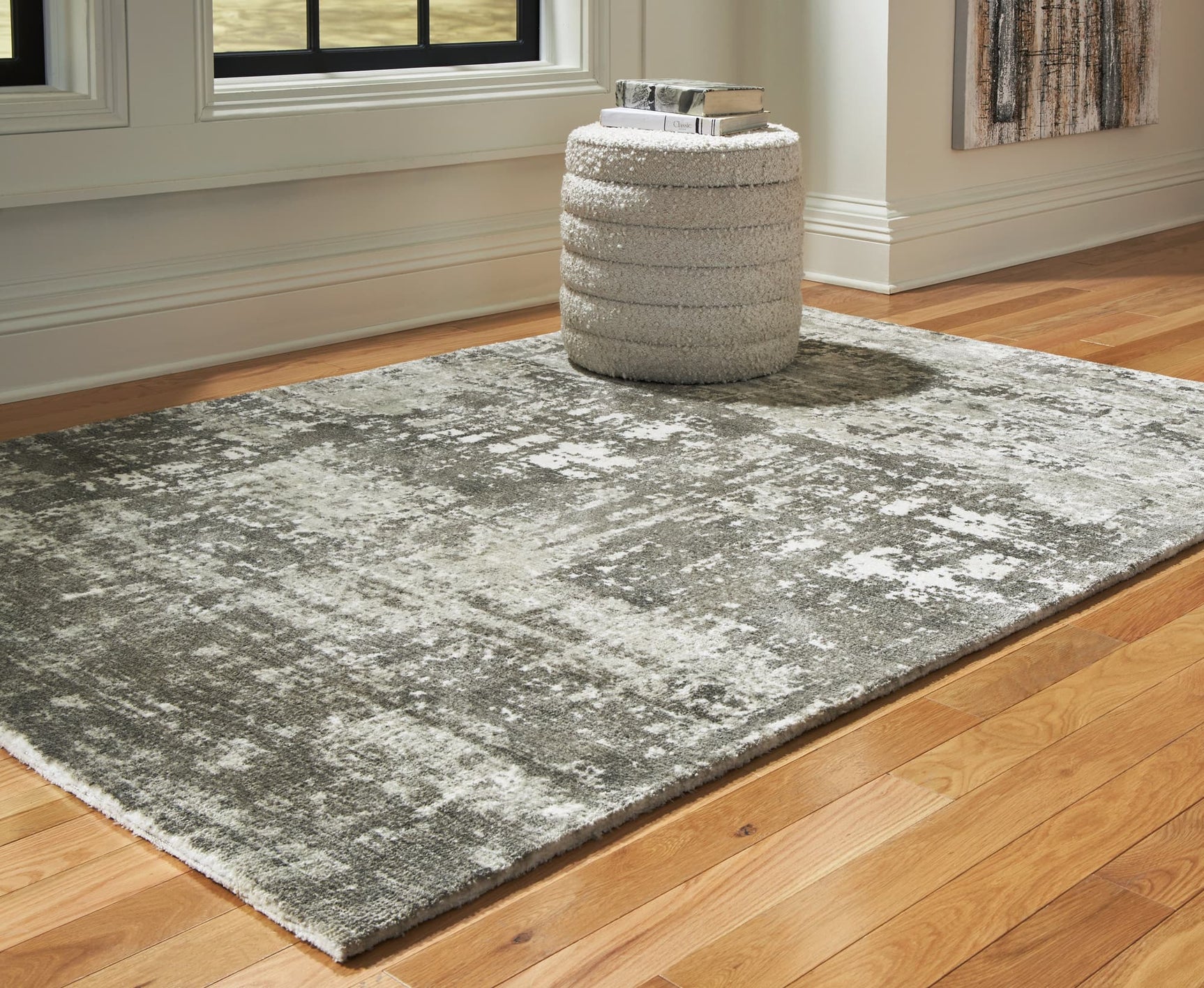 Valmontic Gray Medium Rug laid flat showing abstract gray and ivory design