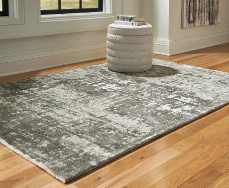Valmontic Gray Medium Rug laid flat showing abstract gray and ivory design