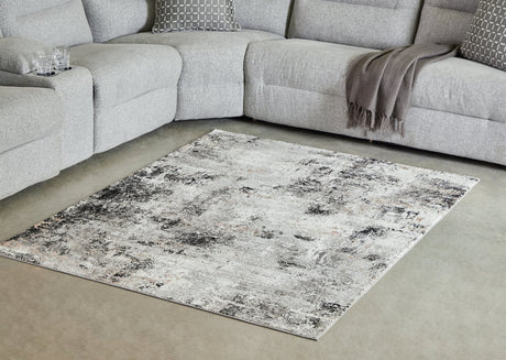 Langwell Medium Rug showcasing abstract black, gray, and white pattern from above