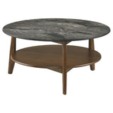 Bradley round coffee table front view with smokey grey tabletop and walnut veneer base