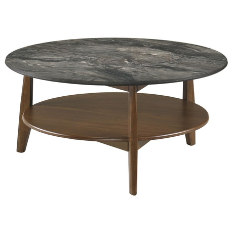 Bradley round coffee table front view with smokey grey tabletop and walnut veneer base