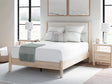 Cadmori Two-Tone Queen Upholstered Panel Bed front angle