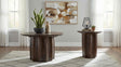 Cayenne coffee table with round walnut top and pedestal base