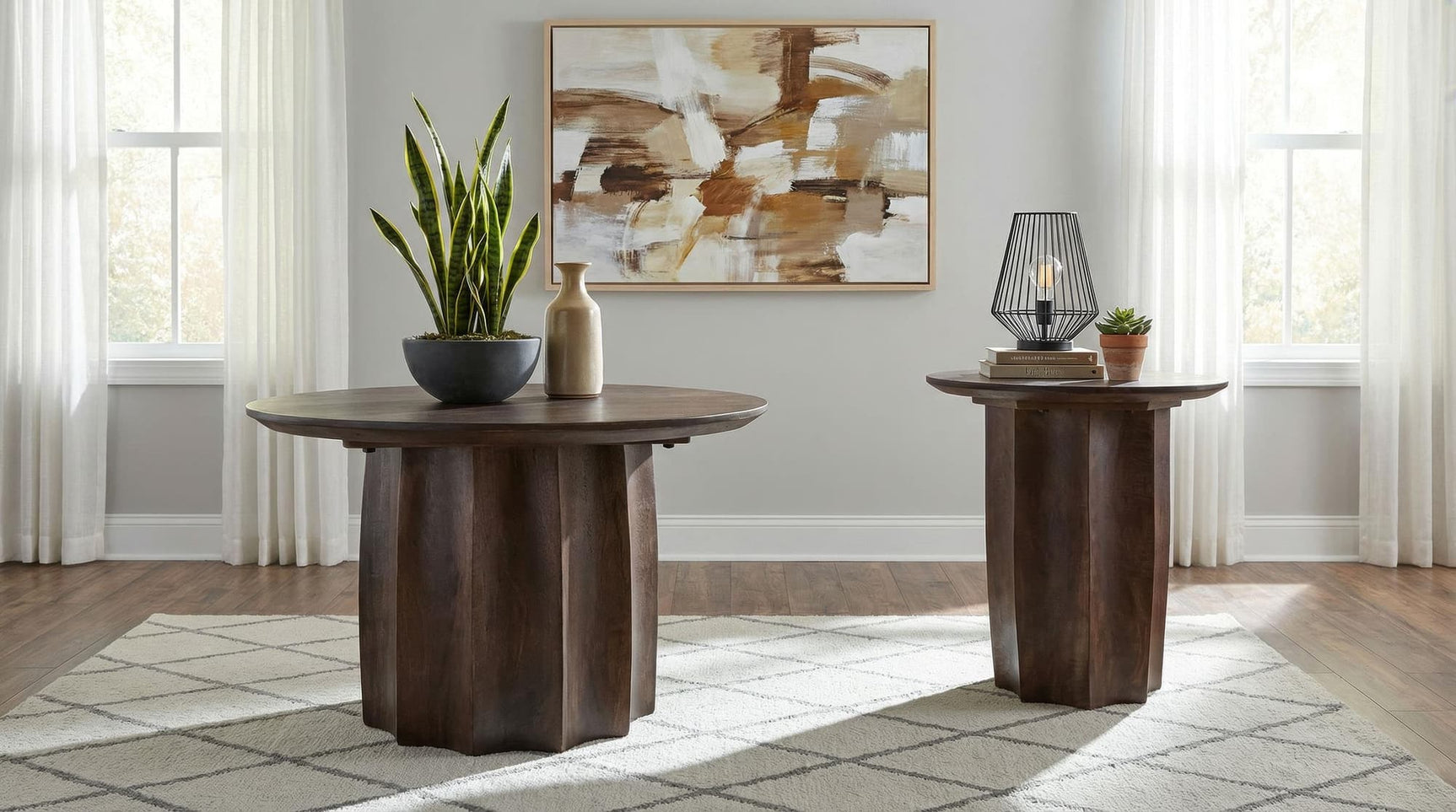 Cayenne coffee table with round walnut top and pedestal base