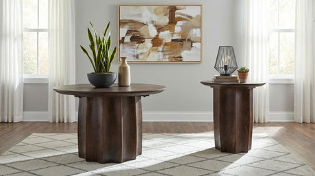 Cayenne coffee table with round walnut top and pedestal base
