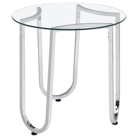 Beller round side table with chrome frame and clear tempered glass top, angled view