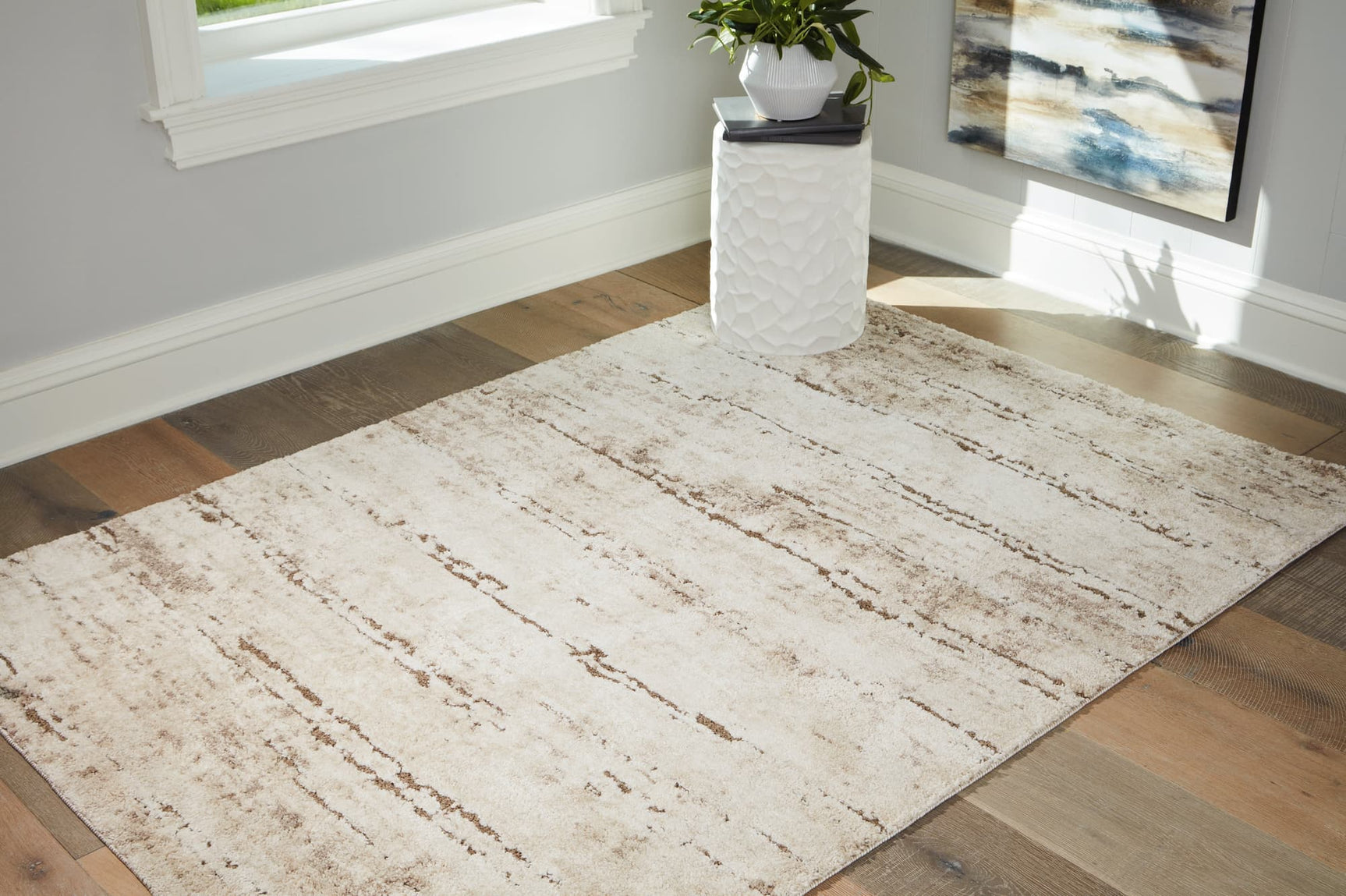 Kasney Medium Rug in cream and brown striped pattern