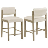 Kehoe upholstered counter height chair front view in cream fabric with natural oak legs
