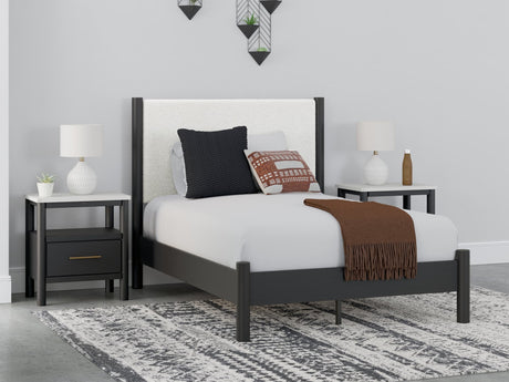 Cadmori Full Upholstered Panel Bed front view showing white upholstered headboard and footboard