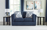 Evansley Navy Nuvella® Loveseat front angle seating view