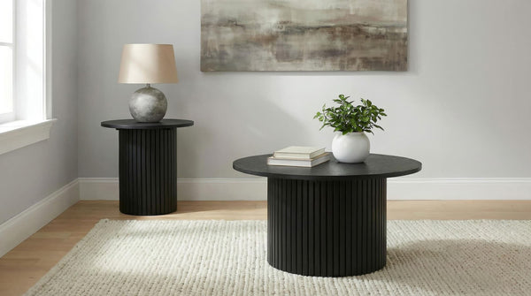 Hamlyn black round fluted coffee table angled side view