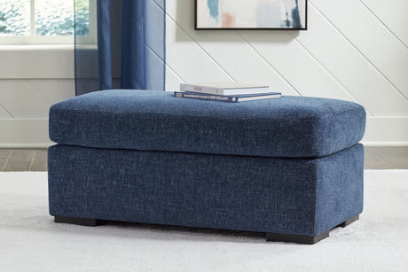 Evansley Navy Nuvella Ottoman angled view