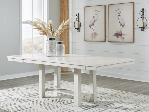 Robbinsdale Antique White Dining Extension Table, angled view with leaves extended
