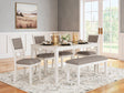 Erinberg antique white dining table with 4 chairs and bench, right angle view
