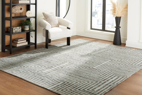 Jossen Ivory and Gray 8x10 area rug laid out flat