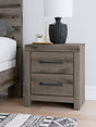 Graystorm brown gray nightstand front view showing drawers