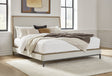 Tomtyn light brown queen upholstered bed angled front view