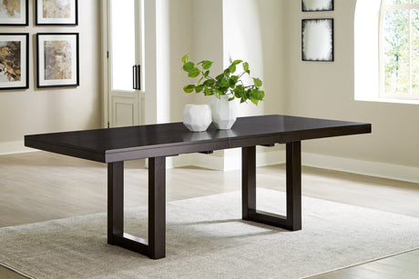 Neymorton Dark Grayish Brown dining extension table angled view