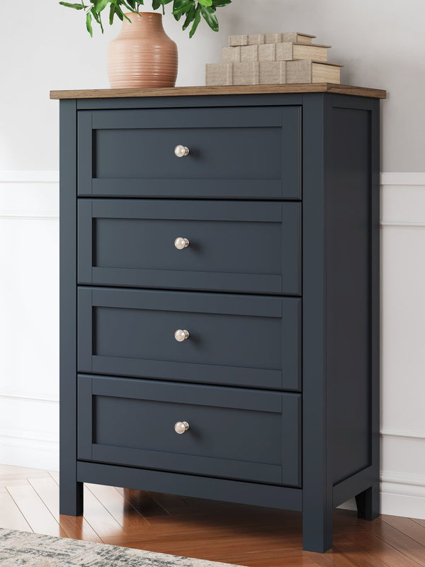 Landocken brown and blue chest of drawers front and side angle