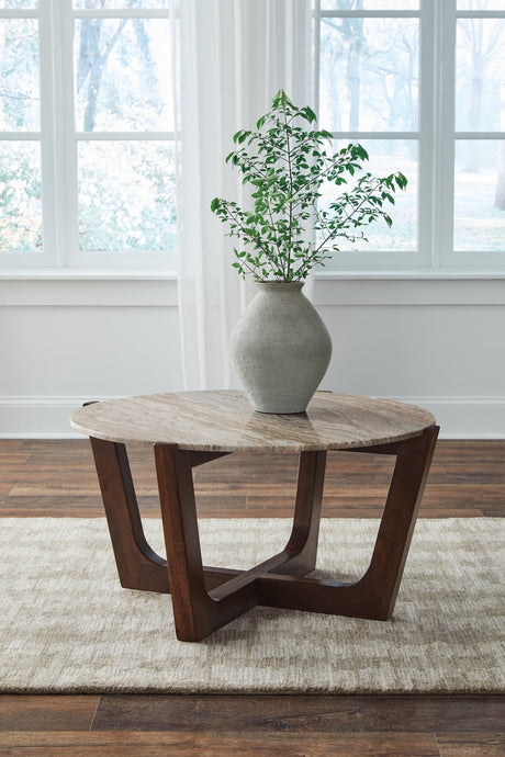 Tanidore coffee table with warm brown mango wood frame and natural marble top angled side view