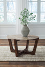 Tanidore coffee table with warm brown mango wood frame and natural marble top angled side view