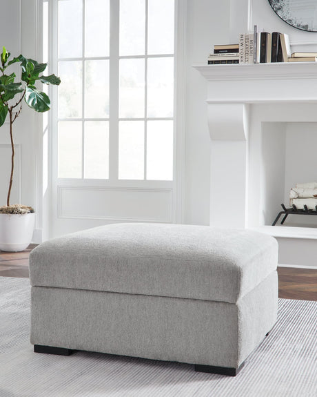 Gabyleigh ottoman in nickel color with closed lid front angle