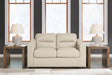 Treasure Trove Almond Leather Match Loveseat angled view