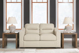 Treasure Trove Almond Leather Match Loveseat angled view