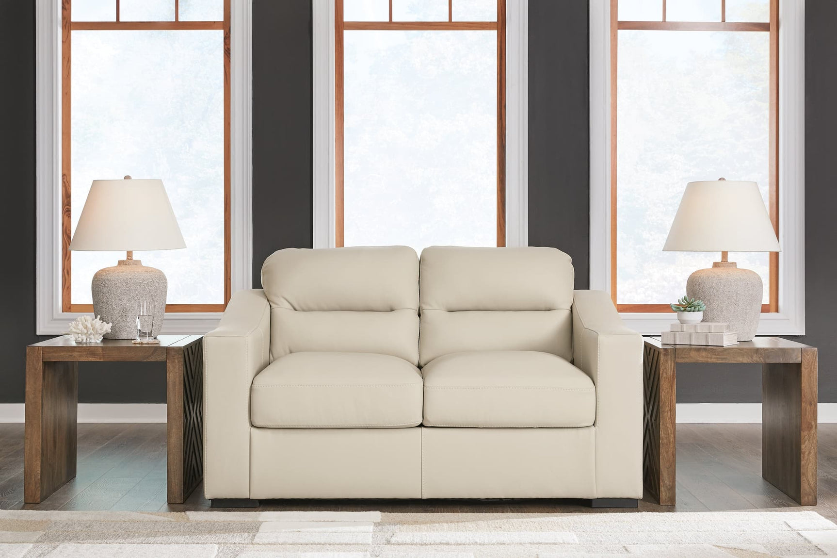 Treasure Trove Almond Leather Match Loveseat angled view