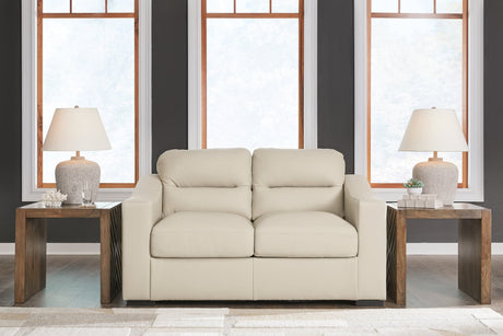 Treasure Trove Almond Leather Match Loveseat angled view