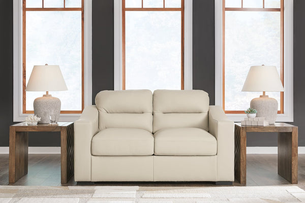 Treasure Trove Almond Leather Match Loveseat angled view