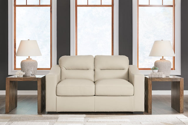 Treasure Trove Almond Leather Match Loveseat angled view